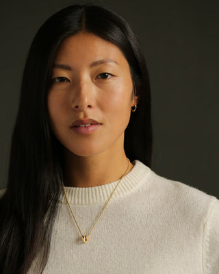 Dominus Trio Necklace by George Rings. Three solid heavy soft 18k yellow gold donuts hanging on a 14k gold round box chain