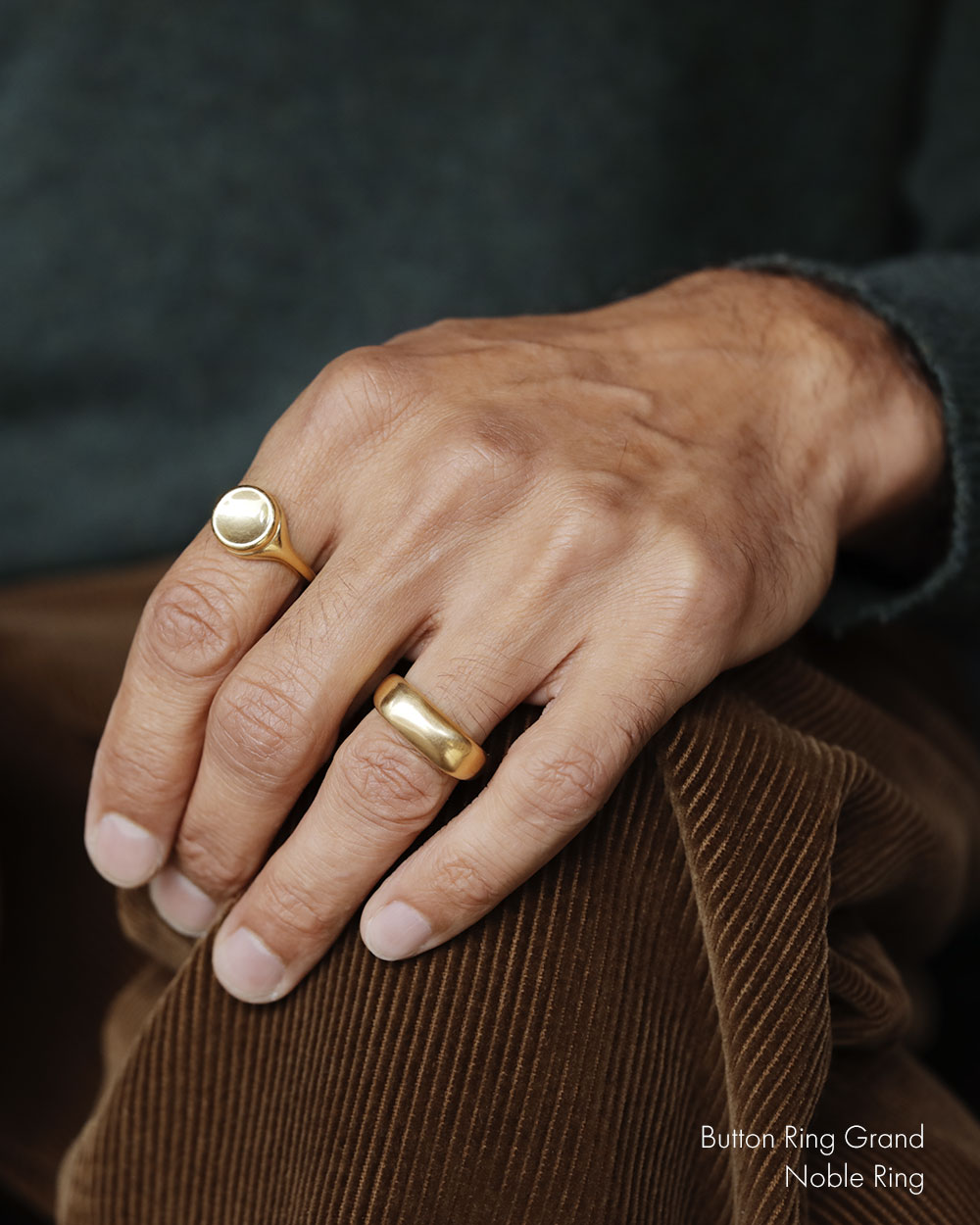 Large 18k yellow solid gold signet style ring with a large soft concave button circle atop the signet.