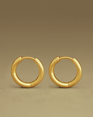 pair of dominus hoops by george rings in solid 18k yellow gold - size large