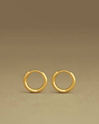 pair of dominus hoops by george rings in solid 18k yellow gold - size small