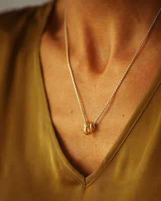 Dominus Trio Necklace by George Rings. Three solid heavy soft 18k yellow gold donuts hanging on a 14k gold round box chain