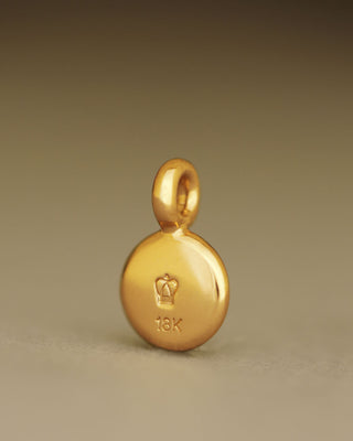 Back view of the Duchess Pendant by George Rings solid 18k yellow gold round cabochon pendant heavy not hollow crown stamp makers stamp