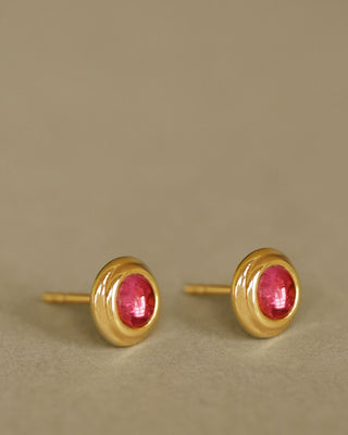 Duchess Studs in pink tourmaline by George Rings. Solid 18K yellow gold round studs with rubellite cabochons in the middle.