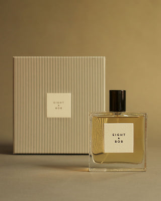 Glass bottle of Eight & Bob Original Perfume with George Rings