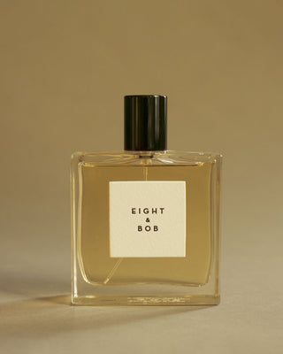 Glass bottle of Eight & Bob Original Perfume with George Rings