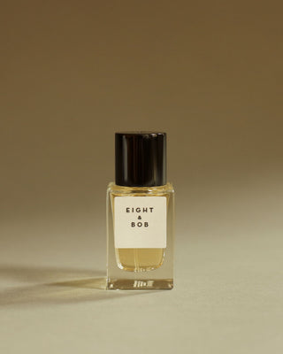 Glass bottle of Eight & Bob Original Perfume with George Rings