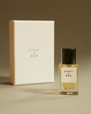 Glass bottle of Eight & Bob Original Perfume with George Rings