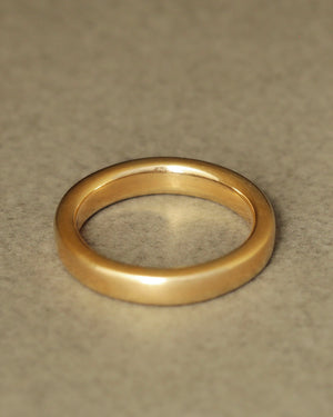 Solid 18k yellow gold simple wedding band. Essential Band by George Rings.