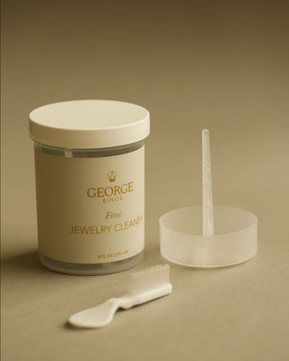 8 oz jar of fine jewelry cleaner by george rings with brush