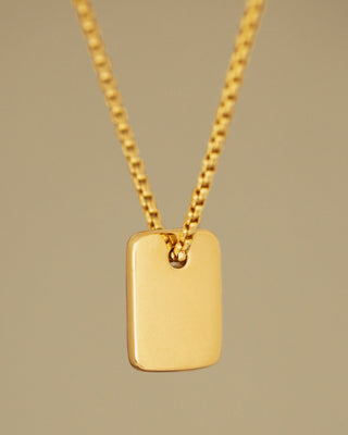 Gold Luggage Tag necklace by Carol Leskanic and George Rings 14k round box chain