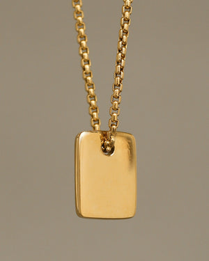 Gold Luggage Tag necklace by Carol Leskanic and George Rings 14k round box chain