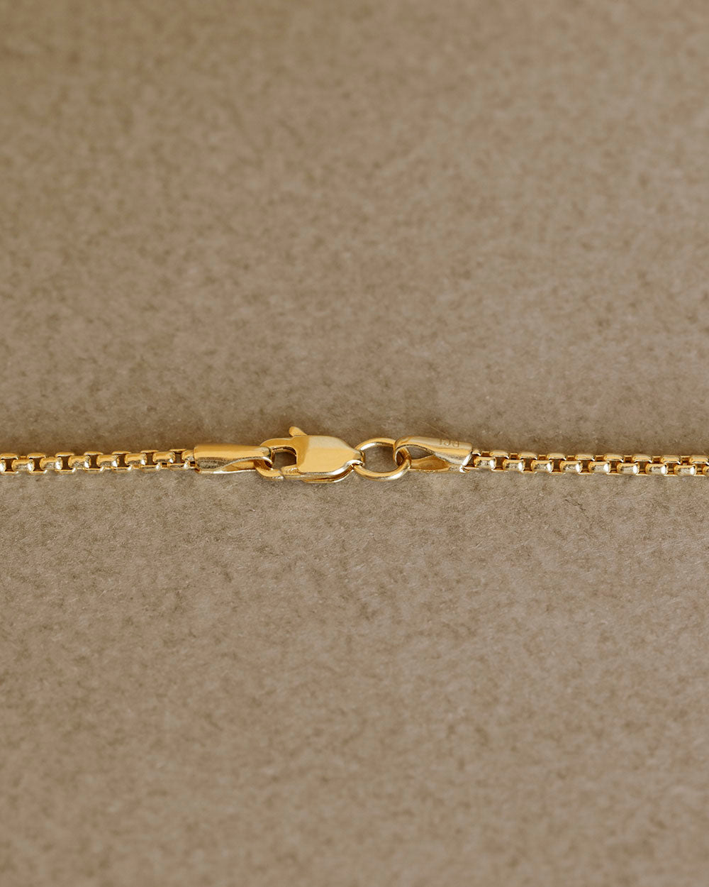 Solid gold box chain by George Rings 14k yellow gold in sizes 18" 20" 22" 24" with a lobster clasp.