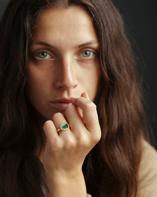 blue-green tourmaline solitaire ring in solid 18K yellow gold by george rings 